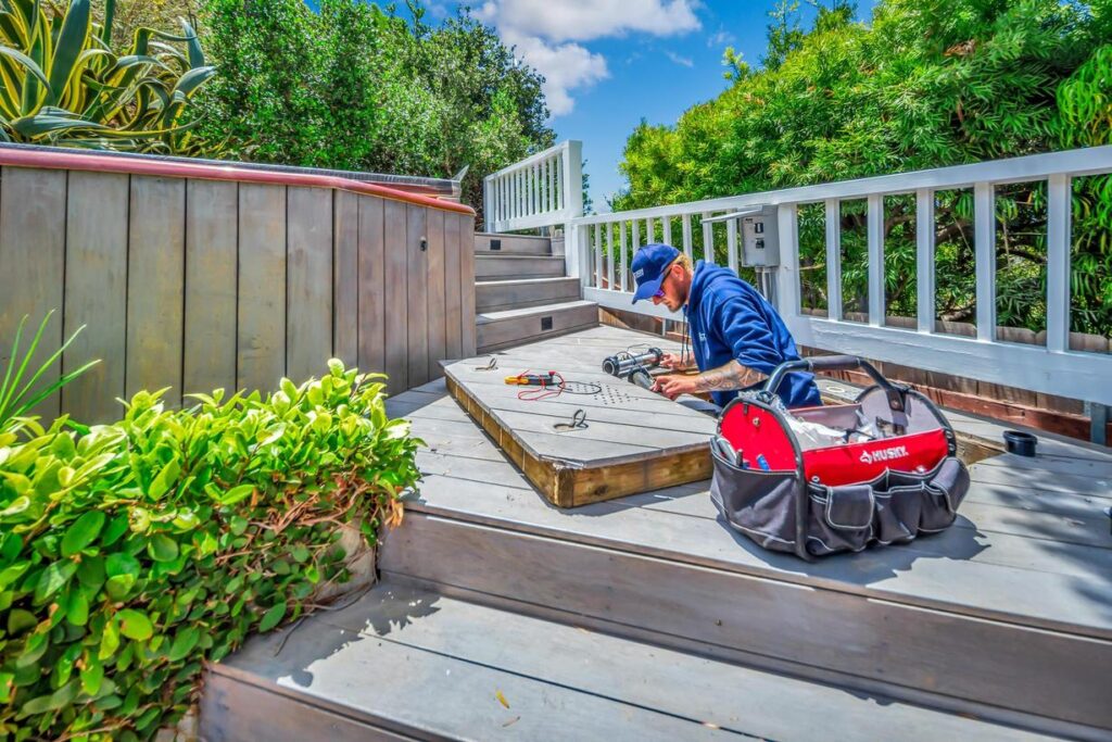 Hot tub repair man working